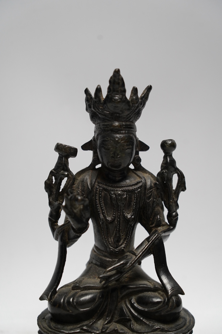 A Chinese lacquered bronze figure of Bodhisattva, 19cm. Condition - fair